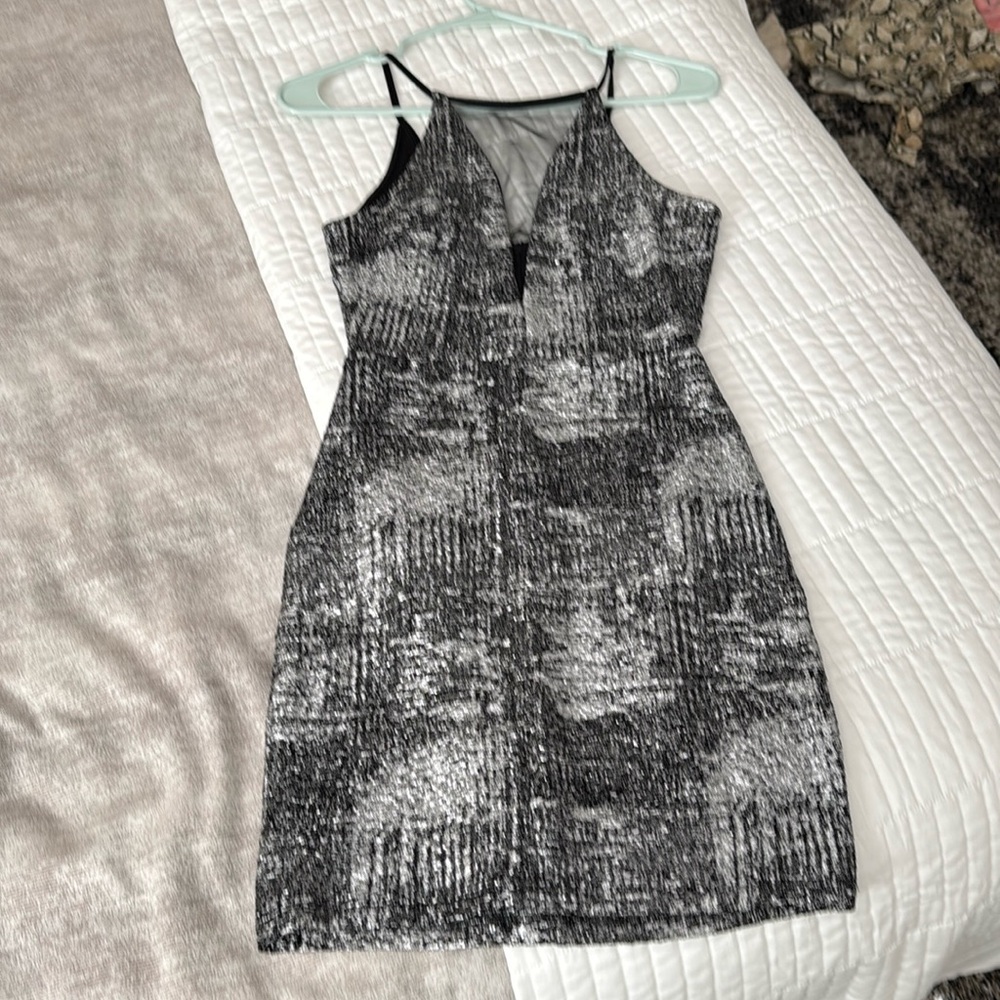 Spectacular black and silver dress with mesh insert - way to sparkle!